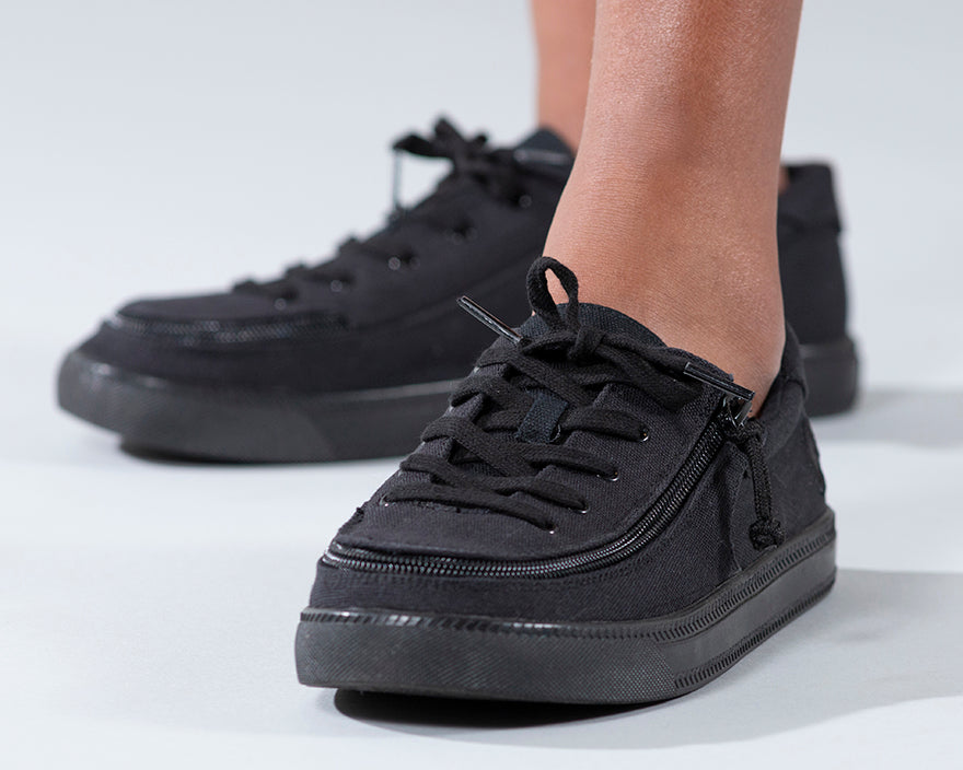 Kid's Black to the Floor Canvas BILLY Classic Lace Lows, zipper shoes, like velcro, that are adaptive, accessible, inclusive and use universal design to accommodate an afo. Footwear is medium and wide width, M, D and EEE, are comfortable, and come in toddler, kids, mens, and womens sizing.