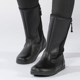Black Rain Boots, zipper shoes, like velcro, that are adaptive, accessible, inclusive and use universal design to accommodate an afo. BILLY Footwear is medium and wide width, M, D and EEE, are comfortable, and come in toddler, kids, mens, and womens sizing.