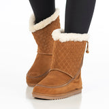 on-foot, toes toward camera, of cozy boots