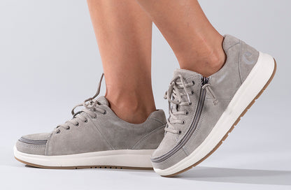 Women's Grey Suede BILLY Comfort Lows, zipper shoes, like velcro, that are adaptive, accessible, inclusive and use universal design to accommodate an afo. Footwear is medium and wide width, M, D and EEE, are comfortable, and come in toddler, kids, mens, and womens sizing.